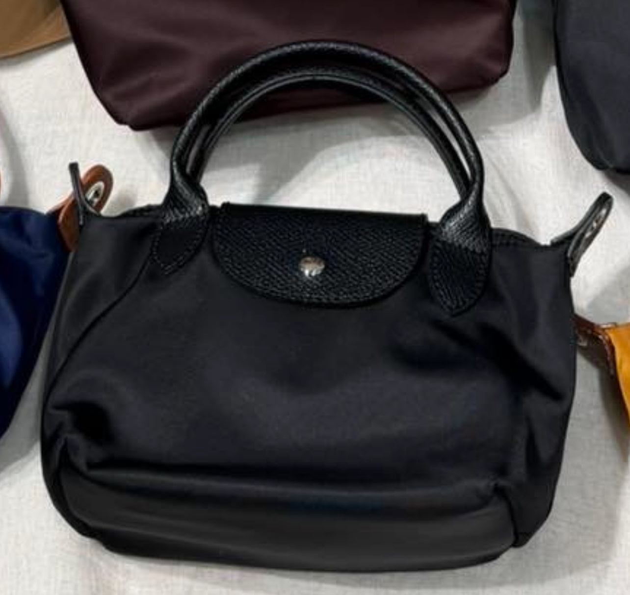 Μίνι τσαντάκι ώμου με χειρολαβή και ρυθμιζόμενο λουράκι