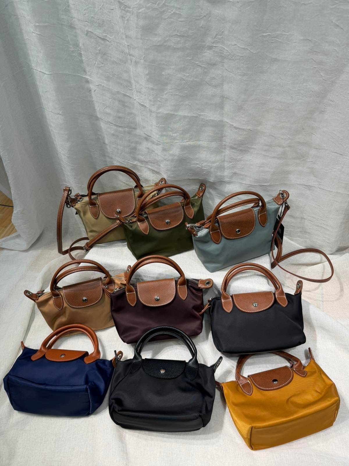 Μίνι τσαντάκι ώμου με χειρολαβή και ρυθμιζόμενο λουράκι